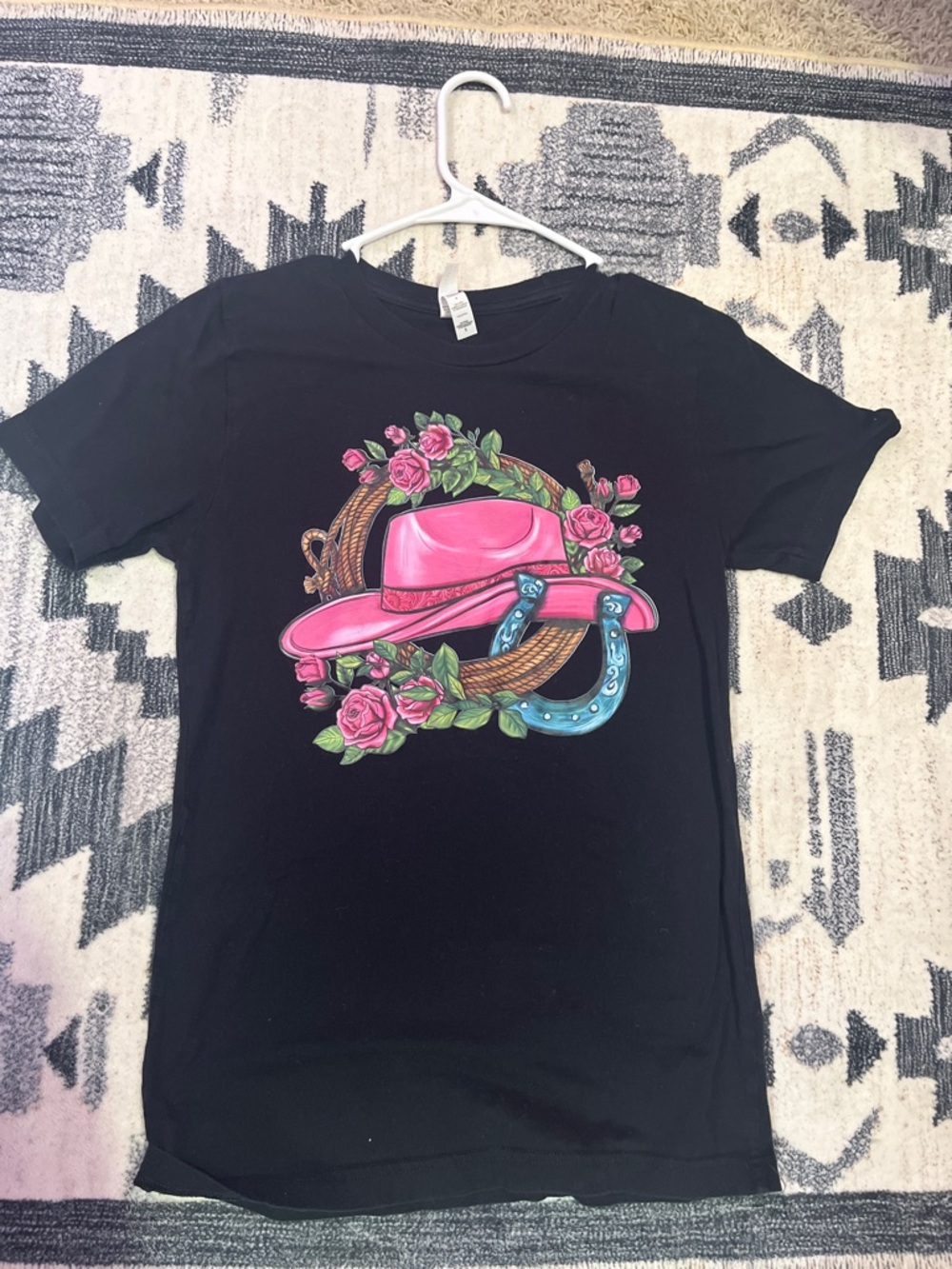 Bella Canvas Black Tee with Pink Cowboy Hat and Blue Horseshoe Graphic